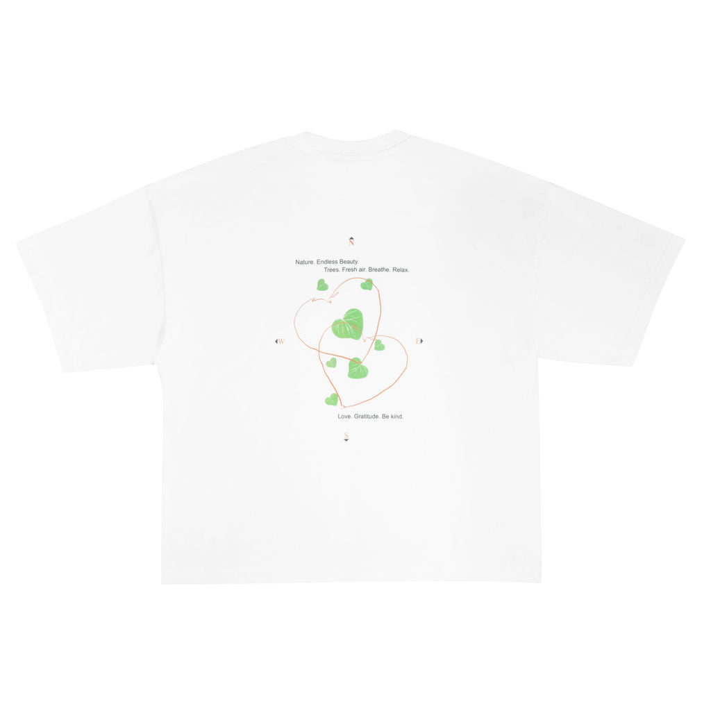 White t-shirt with green graphic design on a white background
